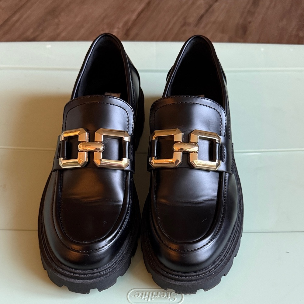 Steve Madden Bellaine Black Loafers with Gold Buckle